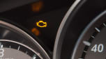 Engine management light showing on a Mazda 6's dashboard